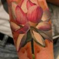 Arm Flower tattoo by Kwadron Tattoo Gallery