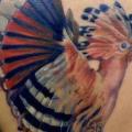 tatuaje Realista Espalda Pájaro por Kwadron Tattoo Gallery