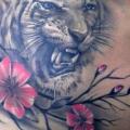 Realistic Flower Side Tiger tattoo by Kwadron Tattoo Gallery