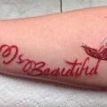 Arm Lettering Lipstick tattoo by Inkaholik Tattoos