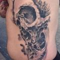 Side Skull tattoo by Inkaholik Tattoos