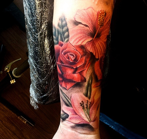 Arm Realistic Flower Tattoo by Sacred Art Tattoo