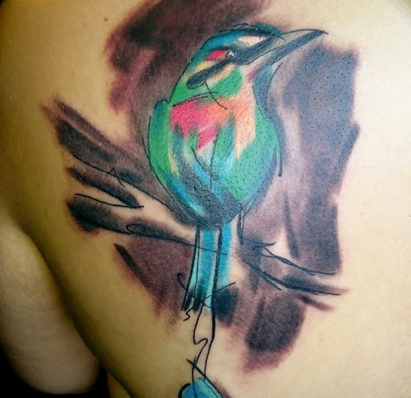 Tatuaggio Petto Uccello Acquarello di Sacred Art Tattoo