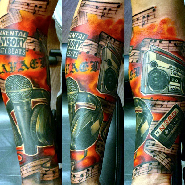 Tatuaggio Musica Manica di Sacred Art Tattoo