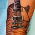 Arm Guitar tattoo by Dave Wah