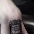 Finger Lion tattoo by Top Gun Tattooing