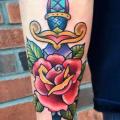 Arm New School Blumen Dolch tattoo von Sacred Tattoo Studio