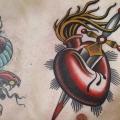 tatuaggio Petto Cuore Pugnale di Sacred Tattoo Studio