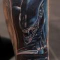 Fantasy Leg Alien tattoo by Slawit Ink