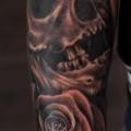 Realistic Flower Skull tattoo by Slawit Ink