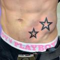 Side Star Belly tattoo by Secret Tattoo & Piercing