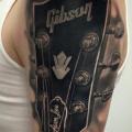 Schulter Realistische Gitarre tattoo von Jesse Rix Tattoo Art