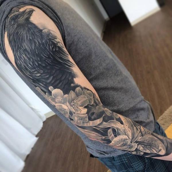 Realistic Flower Crow Sleeve Tattoo by Jesse Rix Tattoo Art