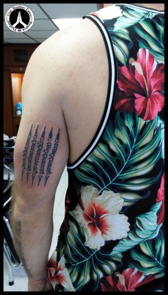 Arm Lettering Tattoo by Thai Bamboo Tattoo