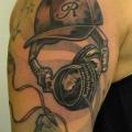 Arm Headphones tattoo by 2nd Skin