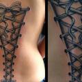 Realistic Back Ribbon tattoo by 2nd Skin