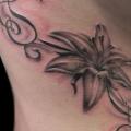 Realistic Flower Side tattoo by 2nd Skin