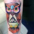 Arm Owl tattoo by Mefisto Tattoo Studio