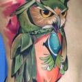 Side Owl tattoo by Mefisto Tattoo Studio