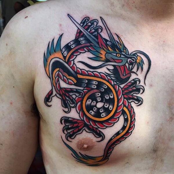 Chest Dragon Tattoo by Cloak and Dagger Tattoo