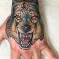 New School Hand Wolf tattoo by Cloak and Dagger Tattoo