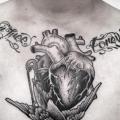 Chest Heart Bird tattoo by Zmierzloki tattoo