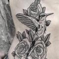 Flower Side Dotwork Hummingbird tattoo by Zmierzloki tattoo