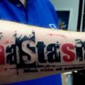Arm Lettering Trash Polka tattoo by Tattoo-77