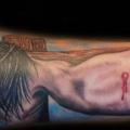 Arm Religious Crucifixion tattoo by Siluha Tattoo