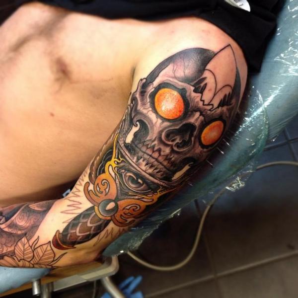 Shoulder Skull Dagger God Tattoo by Dalmiro Tattoo