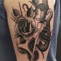 Shoulder Snake Flower Dagger tattoo by Parliament Tattoo