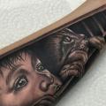 Arm Children Cat tattoo by El Loco Tattoo Lounge