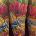 Arm Flower tattoo by El Loco Tattoo Lounge