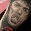 Arm Portrait Realistic Tongue Rolling Stones tattoo by El Loco Tattoo Lounge