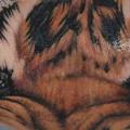 tatuaje Brazo Realista Ojo Tigre por El Loco Tattoo Lounge