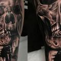 tatuaje Brazo Cráneo por El Loco Tattoo Lounge