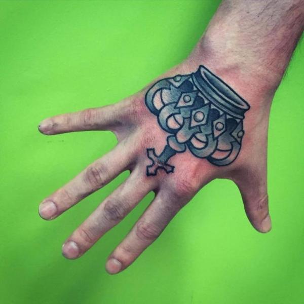 Hand Crown Tattoo by Solid Heart Tattoo