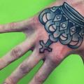 Hand Crown tattoo by Solid Heart Tattoo