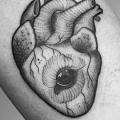 Arm Heart Eye Dotwork tattoo by Logia Barcelona