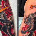 Arm Old School Dagger Panther tattoo by Kings Avenue Tattoo