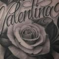 Chest Lettering Rose tattoo by Kings Avenue Tattoo