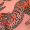 Tiger Oberschenkel tattoo von Electric Anvil Tattoo