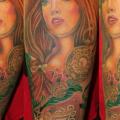 tatuaje Brazo Realista Mujer por Cia Tattoo