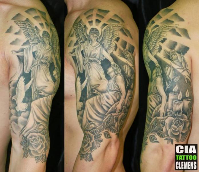 Tatuaje Brazo Ángel Religioso por Cia Tattoo