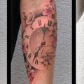 tatuaje Brazo Reloj Flor por Fat Foogo