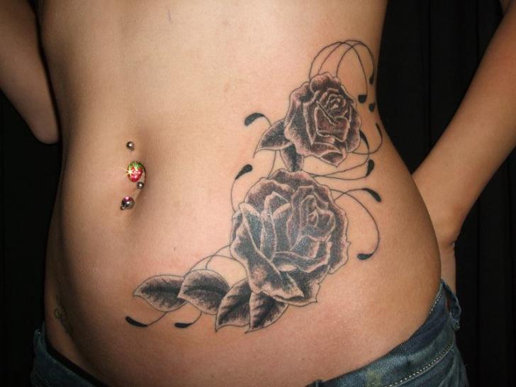 Side Flowers Tattoo by Black Scorpion Tattoos