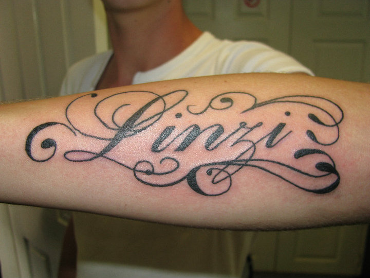 Arm Lettering Tattoo by Crossroad Tattoo