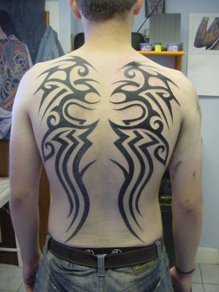 Back Tribal Tattoo by Crossroad Tattoo