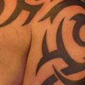 Shoulder Tribal tattoo by DC Tattoo Saloon